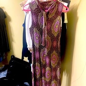 Harold’s size XS. Excellent condition. Lovely dress!